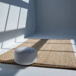 Handwoven jute rug with a subtle chevron pattern